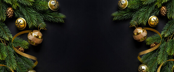 Christmas deco with fir and baubles on dark