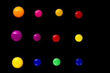 Magnetic paper clips grouped in stitches isolated on black background