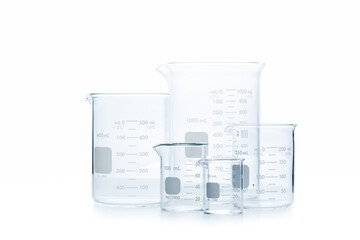 Mix size of measuring beakers for science experiment in laboratory isolated