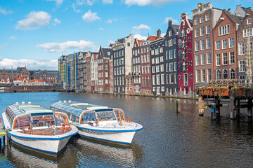 City scenic from Amsterdam at the Damrak in the Netherlands