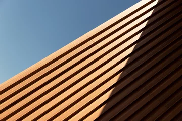 Poster line of wood in detail building and blue sky abstract architecture background © bidala