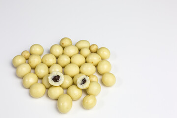 heap of white chocolate balls with coffee beans