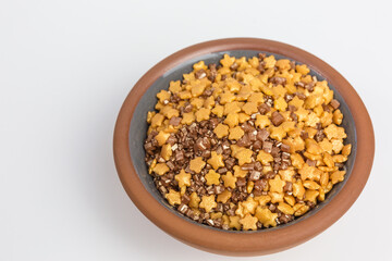 sugar sprinkles in orange and brown with stars