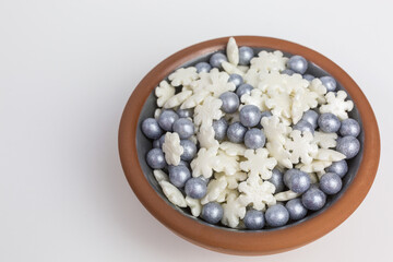 sugar sprinkles in white and grey with snowflakes and balls