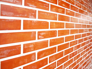 Close up of dirty red brick walls. The walls have a white stain in the horizontal view for a...
