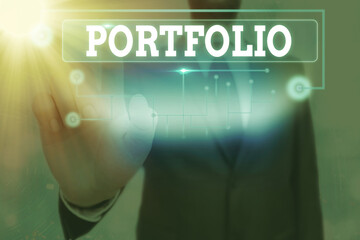 Conceptual hand writing showing Portfolio. Concept meaning securities held by an investor, paper...