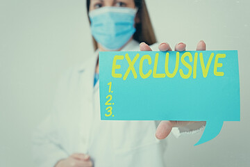 Conceptual hand writing showing Exclusive. Concept meaning limiting or limited to possession of use...