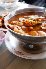 Thai crab sour soup with bamboo shoots