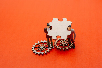 Puzzle piece as business solutions, cooperation, partnership and strategy concept