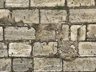 Old grey bricks background