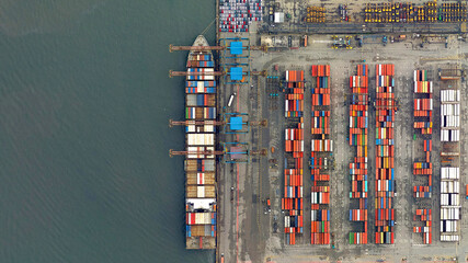 Fototapeta na wymiar trade, ships and containers looking down aerial view from above, bird’s eye view, port of Santos, Brazil