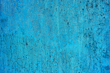 blue cracked paint on metal
