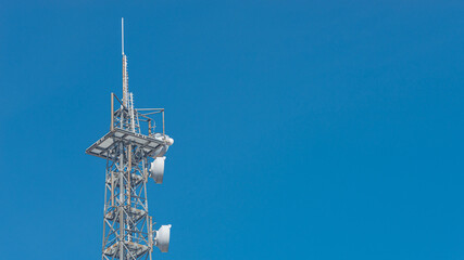 Banner with telecommunication tower with many transmitters and receivers for various radio...