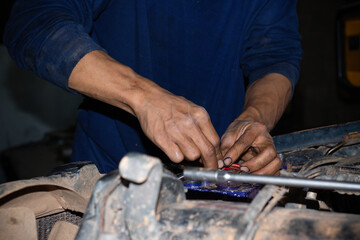 mechanic changing engine