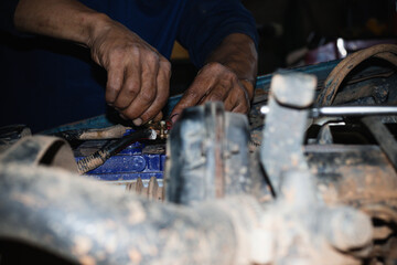 mechanic changing engine