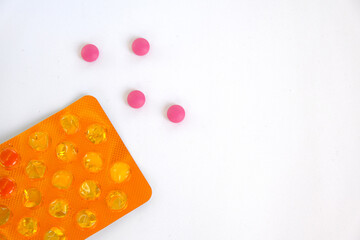 pink pills, orange blister card