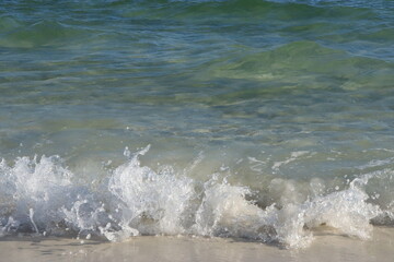 Small waves from the ocean near the shore