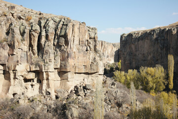 Fototapeta premium View of Ihlara valley at Cappadocia, Turkey. Majestic landscape view with old volcanic rocks in Ihlara valley. Beauty of nature.