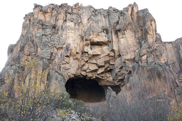 Ancient cave in Ihlara valley, Cappadocia, Turkey. Amazing rocky landscape. Travel to Turkey.