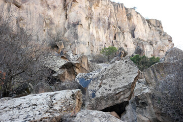 Rocky wall of Ihlara valley, Cappadocia. Stone cliffs background. Geology concept.