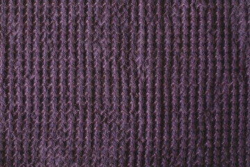 Textured purple linen waffle cotton towel. close up. Natural linen material violet towel pattern background.
