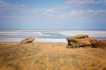 salt lake and mountains against the sky
