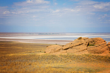 salt lake and mountains against the sky
