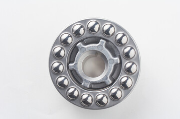 Metal Thrust Ball bearing isolated on white background. Spare part for heavy and automotive industry. Machinery concept.