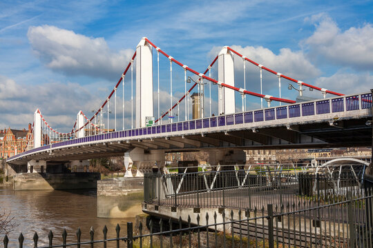 London, UK, February 26, 2012 : Chelsea Bridge across the River Thames connecting Chelsea to Battersea which is a popular travel destination tourist attraction landmark of the city stock photo image