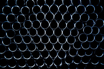 Abstract background of steel pipes stacked on a pallet