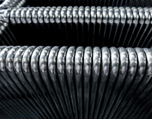 Abstract industrial background of metal pipes construction.