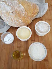 Three flours, white, durum and whole wheat, oil and salt for freshly baked homemade bread