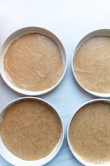 layer cake sandwich tins lines with baking paper 