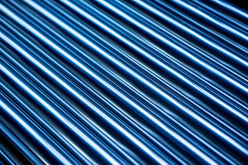 Abstract background of steel pipes stacked on a pallet
