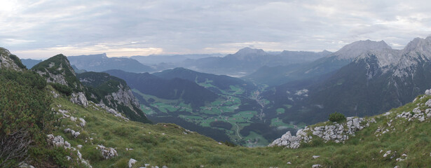 Fototapeta na wymiar Views from the Schottmalhorn and Reiteralpe towards Watzmann and Hochkalter Peaks in the Berchtesgaden National Park in Bavaria.