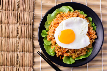 Kimchi fried rice with fried egg on top, Korean food, Top view