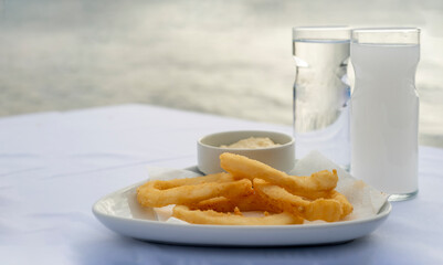 squid appetizer on isolated white background.