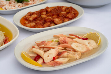 squid appetizer on isolated white background.
