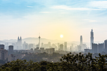 Dawn in Kuala Lumpur with all major iconic sky scrapers visible in frame