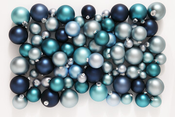 Christmas decorations, top view of pile of glass balls colored in blue, isolated on white, useful as a greeting gift card background 