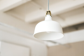 White metal lampshade in modern living room.