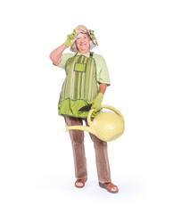 A senior woman gardener isolated on a white background. © LUGOSTOCK
