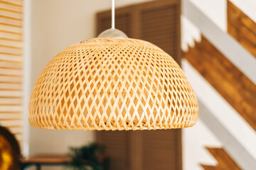 Straw lampshade in modern living room. Eco-friendly interior design using natural materials.
