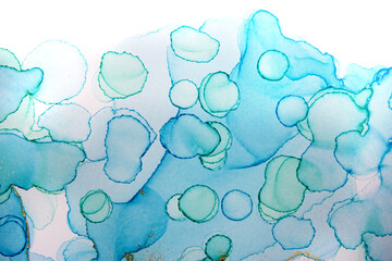 Fototapeta premium Alcohol ink blue handdrawn watercolor drops on white background. Bubbles imitation.