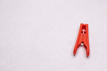 Red plastic clothespins.