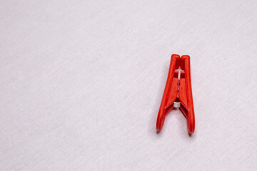 Red plastic clothespins.