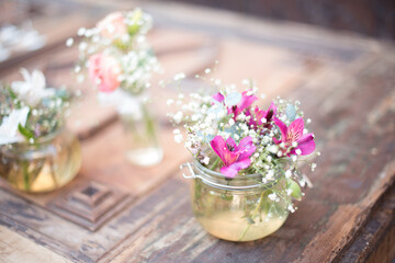 Floral decoration on an antique table.