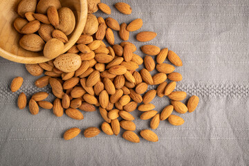 Heap of Raw Almonds on Rustic Background Closeup