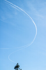 Plane route trace in the blue sky