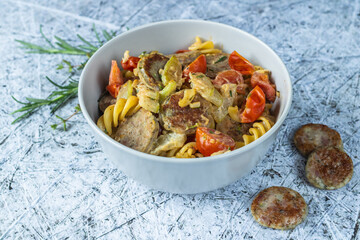 Lunch - spiral pasta with white sausage and vegetables
